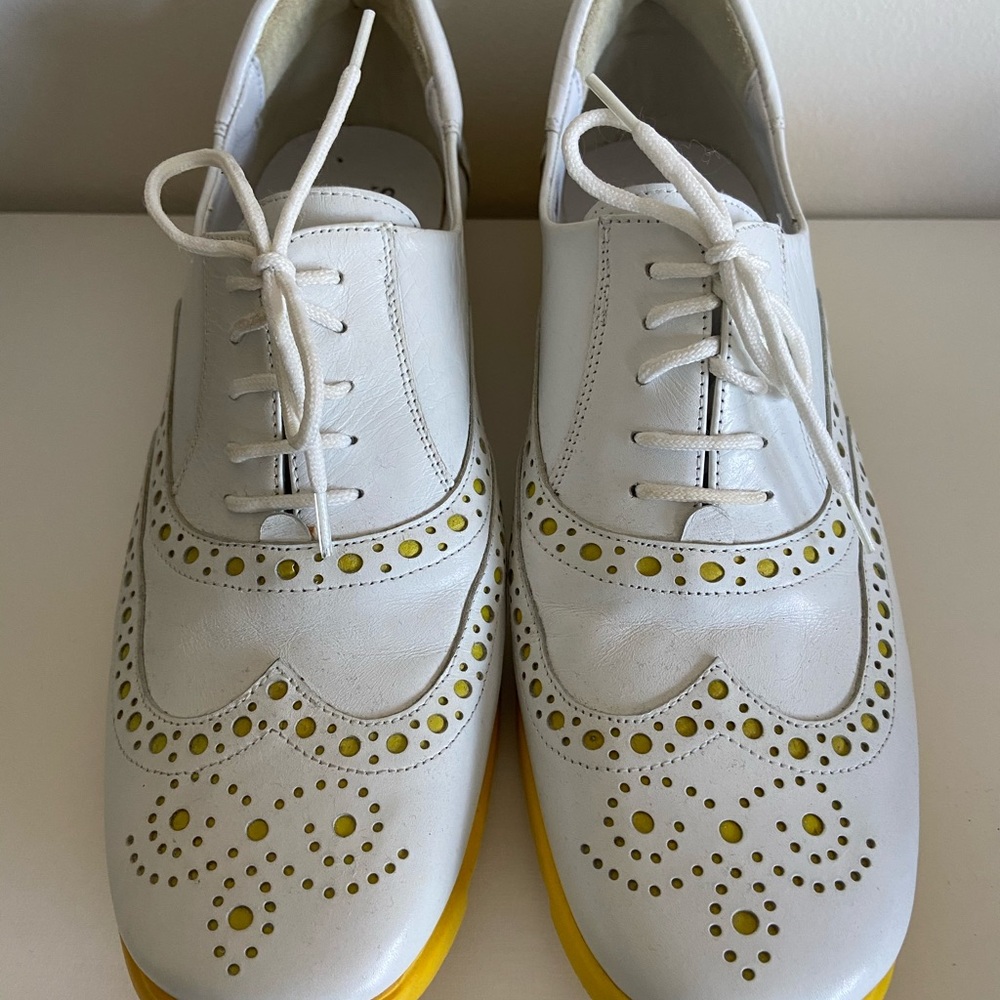Woman’s fashionable golf shoes